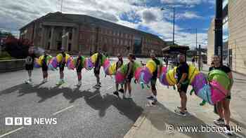 Group completes half-marathon dressed as caterpillar