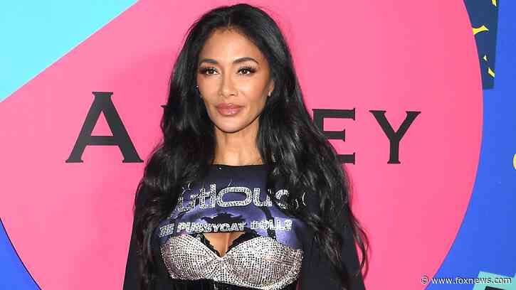 Nicole Scherzinger flaunts toned abs in blue bikini during birthday beach vacation