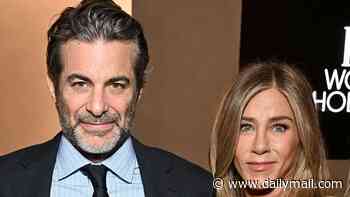 Jennifer Aniston proves she and hypnotherapist boyfriend Jim Curtis are still going strong after rumors of 'tension' in romance