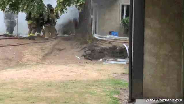 Wild video captures apartment complex electrical room explosion as firefighters investigate smoke call