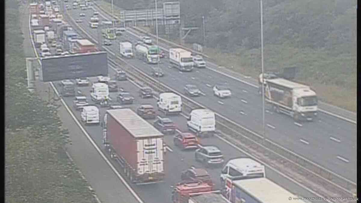 M60 LIVE as all traffic held on motorway with huge queues building
