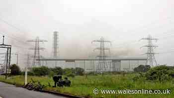 Warning issued as fire rages at old power station - live updates