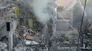 Russian attack kills at least 20, injures scores and causes damage across Ukraine capital