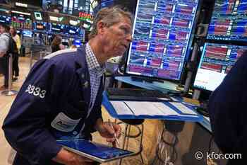 Most U.S. stocks climb toward the finish of a winning week, but drops for tech keep indexes mixed