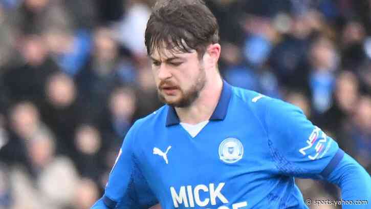 Rochdale sign winger Hayes from Peterborough