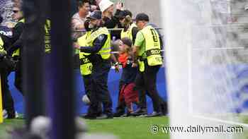 World Cup pitch-invading dwarf reveals he spent five hours in jail after attention-seeking stunt in Seattle