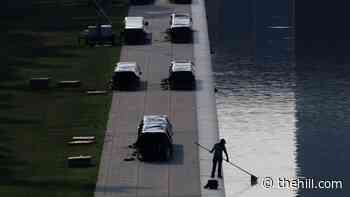 Live updates: Ex-Olympian charged in Reflecting Pool investigation; extreme heat blankets East Coast