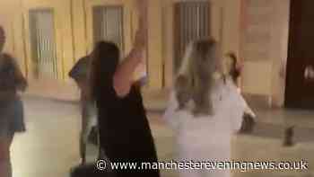 Huge music star starts busking in street in Seville - then tourists realise who it is