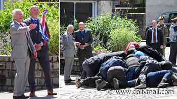 Never mind the tennis! The King is having a ball with the rough and tumble of traditional street sport