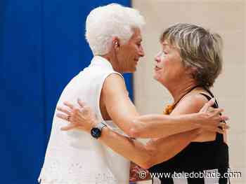 Fort Meigs YMCA swim coach and cancer survivor inspires people around her