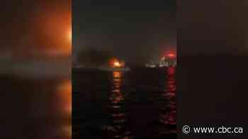 Seven people rescued from burning boat in Detroit River