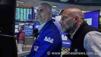 Dow hits record closing high after soft US jobs data