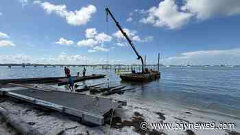 Demolition of day docks at the historic Gulfport Casino Ballroom begins