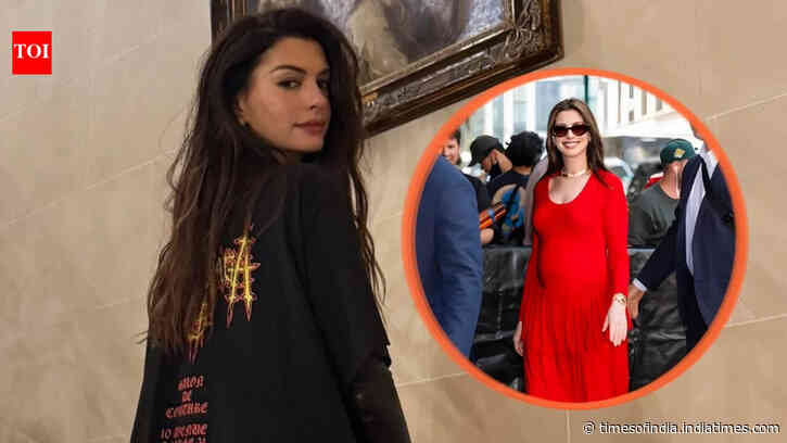 Anne Hathaway laughs off maternity outfit mix-up: "I did?"