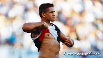 AFL great Nicky Winmar found guilty of dragging a woman by the hair and smashing her head against a door