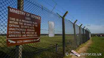 Police helicopter pilot feared death during 'drone' chase over UK military base