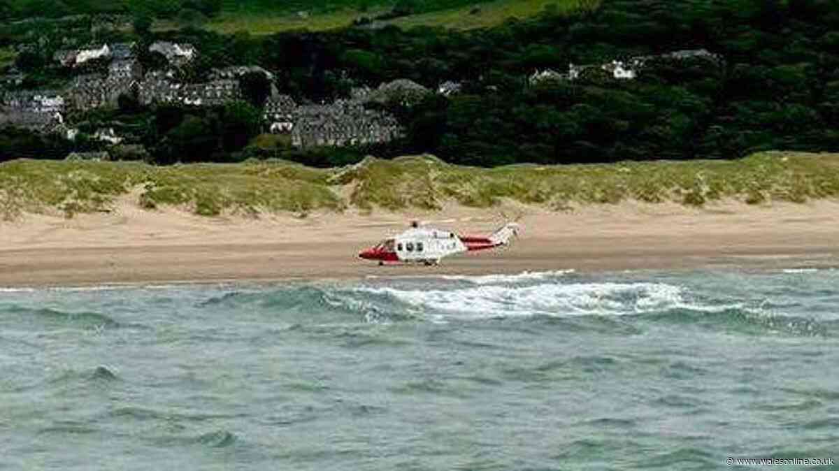 Person clings to cool box for hours after boat capsizes