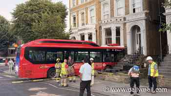 Bus crashes through front window of Notting Hill home after colliding with street furniture and two cars