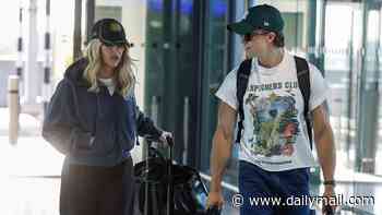 Ellie Goulding and boyfriend Beau Minniear jet out to New York for Taylor Swift's wedding hours after attending Wimbledon together