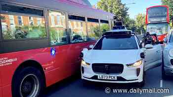 Bus crashes into Waymo driverless car in Notting Hill - before another bus hits a house just yards away