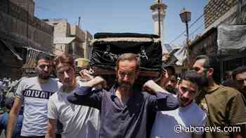 Mourners in Damascus bury cafe blast victims as officials promise justice