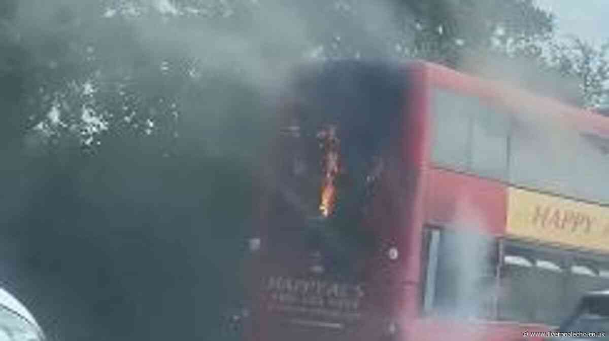 Double-decker bus goes up in flames on East Lancs Road