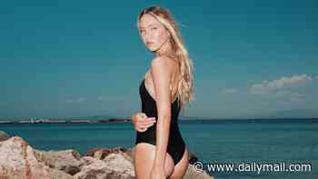 Lila Moss poses in a £325 black Burberry swimsuit as she soaks up the sun in Athens