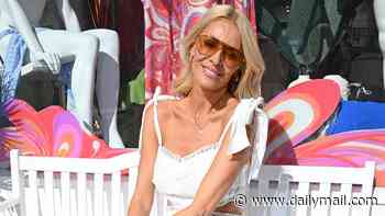 Tess Daly continues to wear her wedding ring after Vernon Kay split as she stuns in a white cut-out dress at her Naia Beach pop-up launch