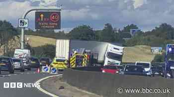 M5 shuts after jackknifed lorry spills diesel