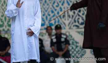 Couple caned by Indonesian province for violating Sharia law by kissing on TikTok