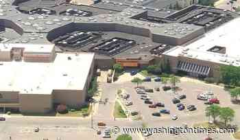 Police investigate a shopping mall shooting that left 2 dead in suburban Detroit