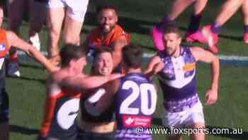 Battered Giants ignite fiery first quarter duel with Fremantle in search of minor miracle — LIVE