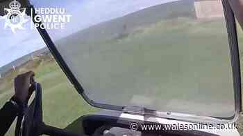 Police hitch ride on golf buggy after spotting robbery suspect in bushes