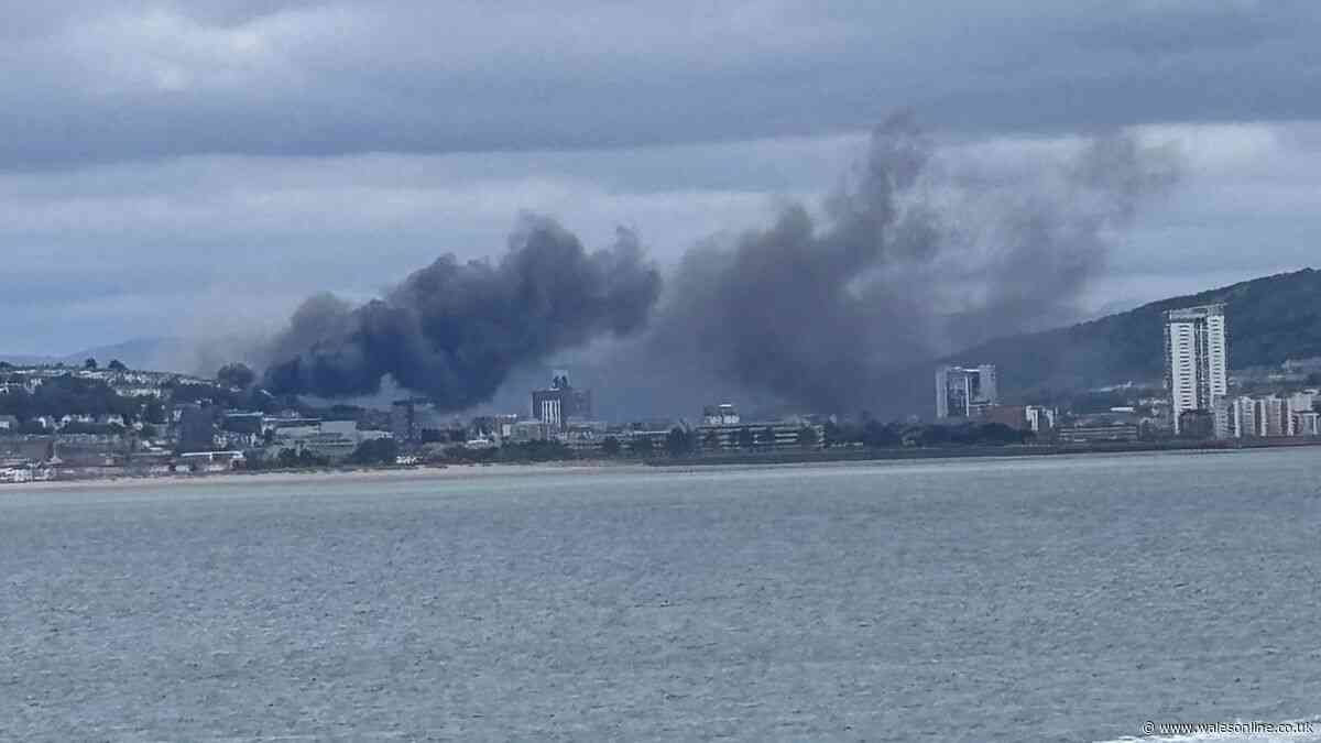 Huge fire breaks out in Swansea with smoke seen for miles around - live updates