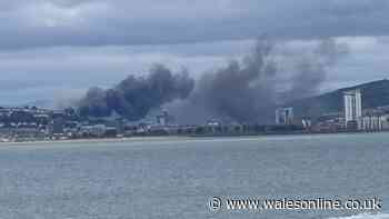 Huge fire breaks out in Swansea with smoke seen for miles around - live updates