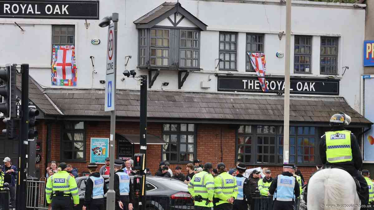 Large police presence as anti immigration protestors march down County Road