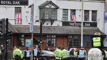 Large police presence as anti immigration protestors march down County Road