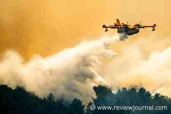 Wildfire southwest of Denver forces thousands to evacuate and destroys more than 160 structures
