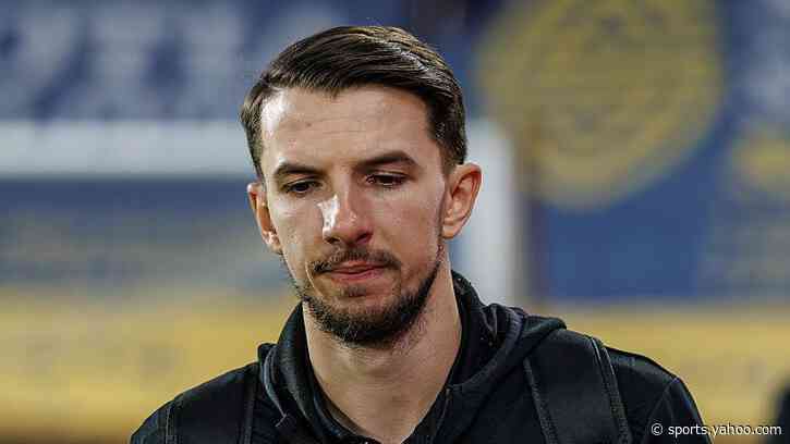 MK Dons sign midfielder Barlaser on free transfer