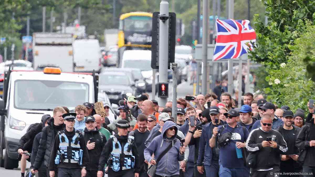 Protestors march on County Road - but many ignore them