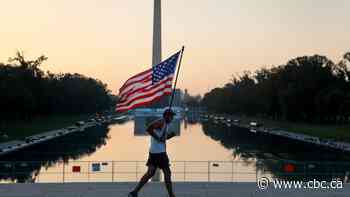Trump faithful flock to curtailed July 4 celebrations