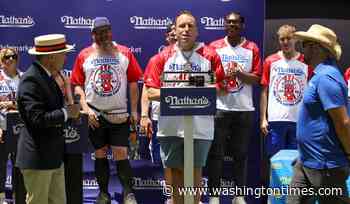 Joey Chestnut scarfs down most July Fourth hot dogs, wins 18th Mustard Belt