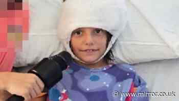 Family 'sleeping in car' to remain close to daughter after horror dog attack