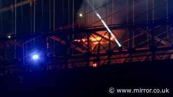 Brooklyn Bridge on fire after Fourth of July fireworks celebrations in New York