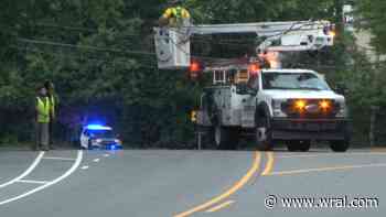 Downed utility lines shuts down road in Raleigh; hundreds lose power