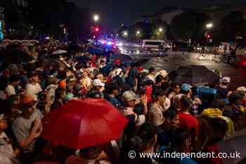 Anger and confusion as Trump keeps July 4 MAGA crowd waiting in rain for more than an hour