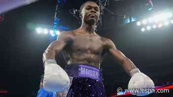 Mason retains title with dramatic 12th-round TKO