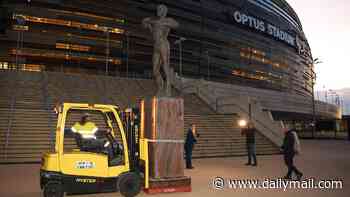 Downfall of a disgraced footy 'legend': The moment Nicky Winmar's statue is removed under the cover of darkness after his conviction for assaulting a woman