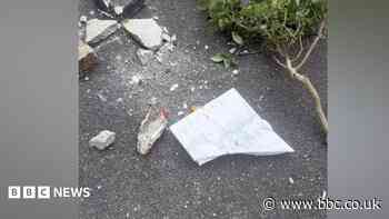 Vandals smash headstones and chapel windows