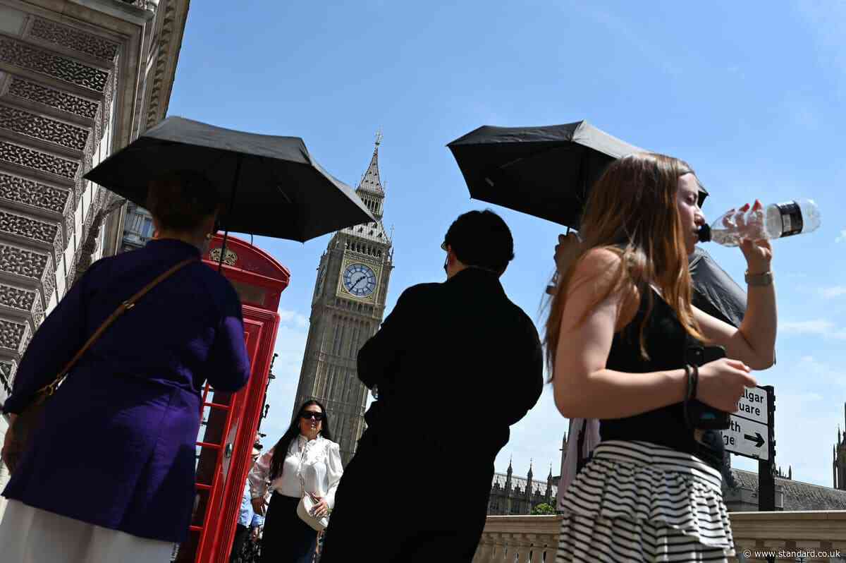 Temperatures of 30C on way as yellow rain warning issued for parts of UK
